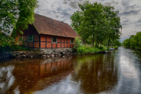 Traditional boathouse beside the Nättrabyån river in Blekinge